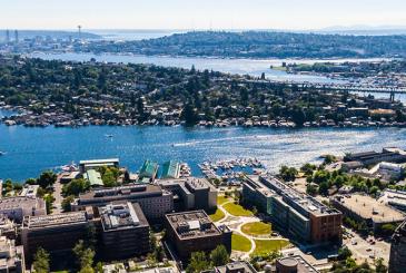 Aerial photo of the south side of the UW campus with Seattle in the distance