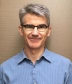 Ian Chapman, smiling