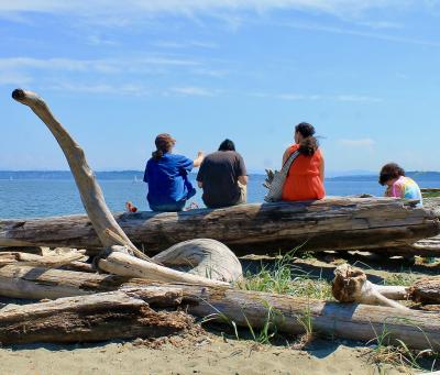 Students enjoy a picnic lunch with a view on Bainbridge Island