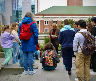 Frank Abe reads to Students in Seattle's CID neighborhood