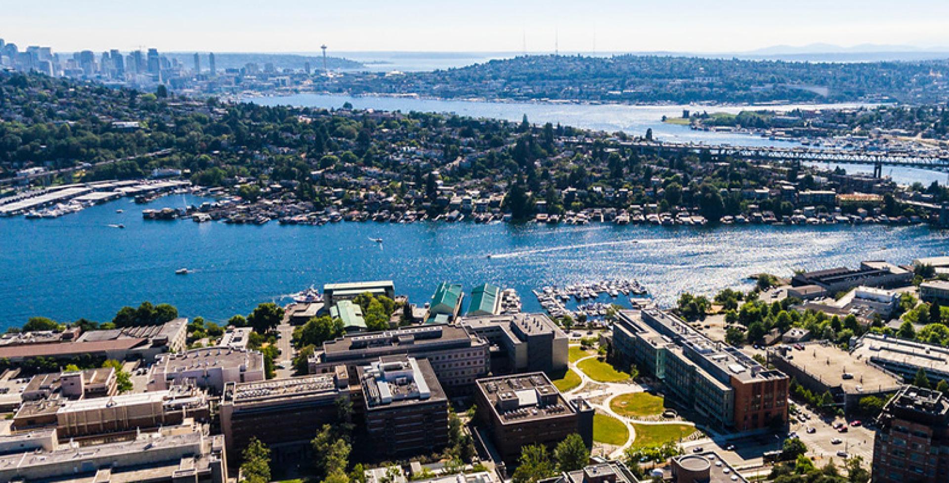 Aerial photo of the south side of the UW campus with Seattle in the distance